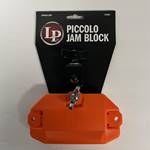 LP Piccolo Jam Block - Orange.
- Highest pitch jam block available from LP in a bright orange color.
- Crafted from Jenigor, LP's exclusive patented plastic formula.
- Strength and durability to withstand even the hradest-hitting players.
- Heavy duty mounting bracket and LP eye-bolt assemmbly included.