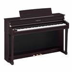 Yamaha Clavinova Rosewood CLP-845R.

For musicians who enjoy innovation, we developed the versatile CLP-845. Featuring superb GrandTouch-S keyboard action, as well as the incomparable sounds of two flagship concert grands: the Yamaha CFX and the Bösendorfer Imperial. The CLP-845 is traditional on the outside, and groundbreaking on the inside.

GRAND EXPERIENCE - 
Enjoy the extraordinarily realistic touch and feel of a grand piano through the GrandTouch-S keyboard and the GrandTouch pedal. The keyboard's escapement provides a satisfying click when keys are pressed, a sensation unique to grand pianos, while the light-to-heavy weighted keys ensure precise playability

IMMERSIVE SOUND - 
Enjoy immersive sound through a revolutionary 2-way speaker system with diffuser technology. The Binaural CFX voice with Grand Expression Modeling and Virtual Resonance Modeling (VRM) delivers vivid and richly varied tones, capturing the countless nuances of a concert grand piano.

TIMELESS BEAUTY - 
The CLP-845 boasts a beautifully crafted design, blending classic aesthetics with contemporary usability. Its space-saving, taller acoustic cabinet with modesty panel enhances any room. The user-friendly LCD display and onboard interface features make navigation a breeze, while the wide music rest with page clips adds convenience for all your musical needs.

A LEGACY OF EXCELLENCE - 
The CLP-845 carries the legacy of Yamaha craftsmanship and expertise, delivering the genuine sound and feel of a grand piano. You’ll experience the timeless tone and quality that Yamaha is renowned for, ensuring a realistic and rich playing experience.

SMART PIANIST WITH POWERFUL SHEET MUSIC READER TECHNOLOGY - 
Enjoy the Clavinova even more with Smart Pianist, an exclusive app from Yamaha. This robust app includes Sheet Music Reader technology, which plays the notes of any "You Are The Artist" sheet music on your smart device. You can also control every feature and setting of your instrument with Smart Pianist, as well as learn to play hundreds of popular songs with its built-in lessons.