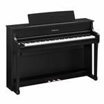 Yamaha Clavinova Matte Black, CLP-875B.

The CLP-875 offers the breathtaking sound of a grand piano in a gorgeous upright cabinet. Featuring GrandTouch Keyboard action with the longest key-to-fulcrum length in any digital piano, as well as the tones of two legendary grand pianos. From tone to touch, the CLP-875 delivers an immersive concert grand experience.

GRAND EXPERIENCE
The combination of the GrandTouch keyboard with wooden keys, GrandTouch pedal, and GP Response Damper delivers the extraordinarily lifelike feel of an acoustic grand. The GrandTouch keyboard's escapement provides a satisfying bump or click when keys are pressed, a sensation unique to grand pianos, while the light-to-heavy weighted keys ensure precise playability.

IMMERSIVE SOUND
Enjoy immersive sound through a 3-way speaker system with diffuser technology. The binaurally sampled Bösendorfer and CFX Voices with Grand Expression Modeling, combined with Virtual Resonance Modeling (VRM), delivers vivid and richly varied tones, capturing the countless nuances of a concert grand piano.

TIMELESS BEAUTY
The CLP-875 is beautifully crafted with a classic aesthetic while delivering a contemporary user experience. Its space-saving, taller acoustic cabinet design adds elegance to any space, while the easy-to-use LCD display ensures effortless navigation of onboard interface features.

A LEGACY OF EXCELLENCE
The CLP-875 carries the legacy of Yamaha craftsmanship and expertise, delivering the genuine sound and feel of a grand piano. You’ll experience the timeless tone and quality that Yamaha is renowned for, ensuring an realistic and rich playing experience.

SMART PIANIST WITH POWERFUL SHEET MUSIC READER TECHNOLOGY
Enjoy the Clavinova even more with Smart Pianist, an exclusive app from Yamaha. This robust app includes Sheet Music Reader technology, which plays the notes of any "You Are The Artist" sheet music on your smart device. You can also control every feature and setting of your instrument with Smart Pianist, as well as learn to play hundreds of popular songs with its built-in lessons.