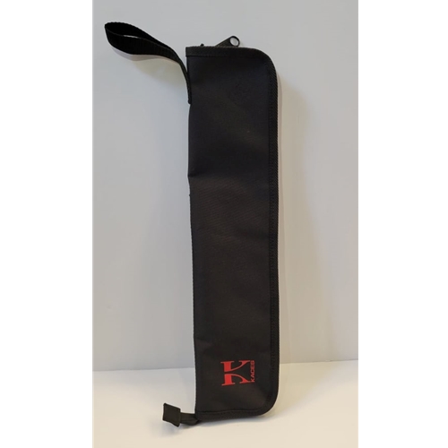 Kaces Slim Stick Bag.
"Keep your sticks all in one bag"
Elastic straps with hooks to secure to drum.
Large outer pocket.
Durable polyester exterior.