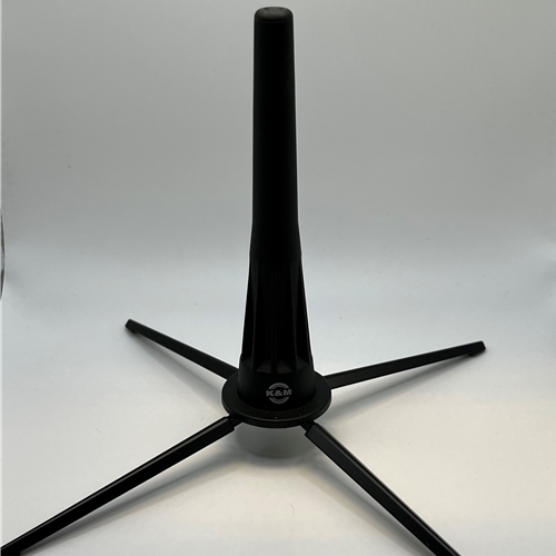 Oboe Stand - K&M.
"Compact stand stores in the bell!"
Four-leg base provides great stability.
Made from durable black plastic.
Legs fold to fit inside clarinet bell.