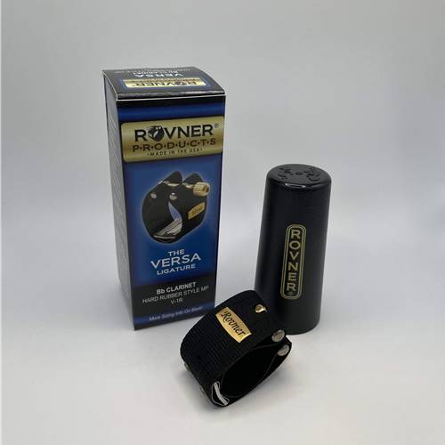 Rovner Versa Bb Clarinet Ligature.

Features:
- Repositionable flaps and cradle with inserts that can be configured to produce six different tones.
- Rewards the player with a big, rich sound.
- Complete tonal control.
- Accurate intonation through all registers
F- laps may be arranged asymmetrically to accommodate irregular reeds.
- Includes a Rovner® cap.
- Made in the USA!