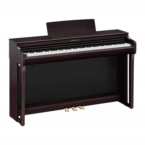 Yamaha Clavinova, CLP-825B, Rosewood.

Discover the perfect blend of tradition and innovation with the CLP-825. Featuring a GrandTouch-S keyboard with escapement for a truly realistic grand piano experience. Seamless integration with smart devices ensures endless entertainment and learning possibilities. With a space-saving console, unmatched quality, and world-class sound, the CLP-825 is a standout instrument.

GRAND EXPERIENCE - 
Enjoy the extraordinarily realistic touch and feel of a grand piano through the GrandTouch-S keyboard and the GrandTouch pedal. The keyboard's escapement provides a satisfying click when keys are pressed, a sensation unique to grand pianos, while the light-to-heavy weighted keys ensure precise playability.

IMMERSIVE SOUND - 
Enjoy immersive sound through a revolutionary speaker system with diffuser technology. The Binaural CFX voice with Grand Expression Modeling and Virtual Resonance Modeling (VRM) delivers vivid and richly varied tones, capturing the countless nuances of a concert grand piano.

TIMELESS BEAUTY - 
The CLP-825 is beautifully crafted, blending a classic aesthetic with a contemporary user experience. Its space-saving console-style cabinet adds elegance to any room without taking up too much space.

A LEGACY OF EXCELLENCE - 
The CLP-825 carries the legacy of Yamaha craftsmanship and expertise, delivering the genuine sound and feel of a grand piano. You’ll experience the timeless tone and quality that Yamaha is renowned for, ensuring a realistic and rich playing experience.

SMART PIANIST WITH POWERFUL SHEET MUSIC READER TECHNOLOGY - 
Enjoy the Clavinova even more with Smart Pianist, an exclusive app from Yamaha. This robust app includes Sheet Music Reader technology, which plays the notes of any "You Are The Artist" sheet music on your smart device. You can also control every feature and setting of your instrument with Smart Pianist, as well as learn to play hundreds of popular songs with its built-in lessons.